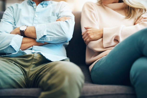 couple with arms crossed after an argument